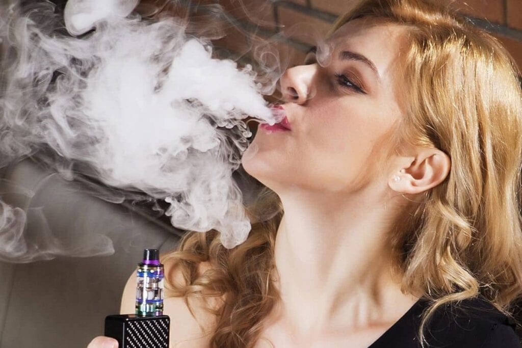 A woman smoking CBG Vape