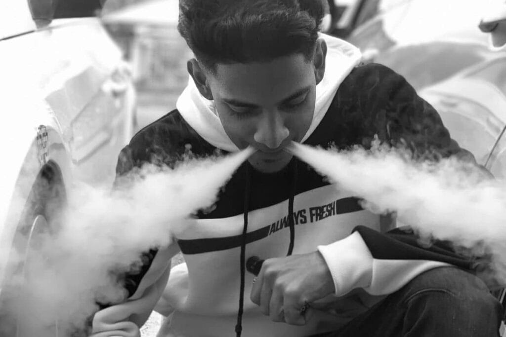 A guy smoking THC delta 8