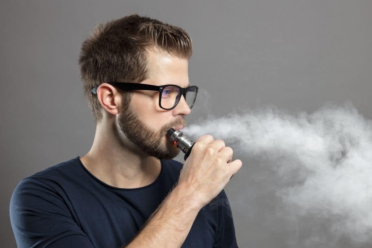 A man smoking delta 9 vape A man smoking delta 9 vape