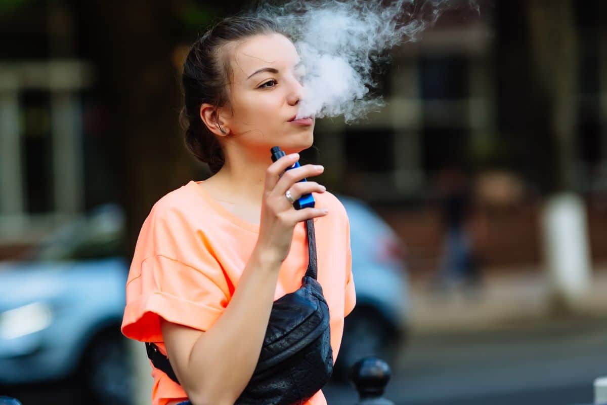 A woman vaping delta 8