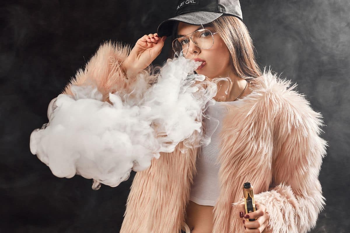 A girl smoking THCa