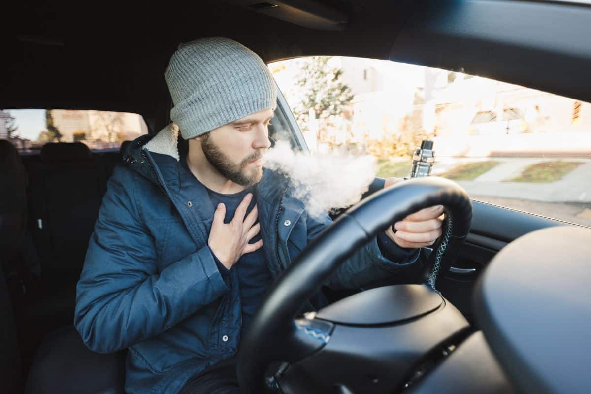 A guy coughing while vaping A guy coughing while vaping