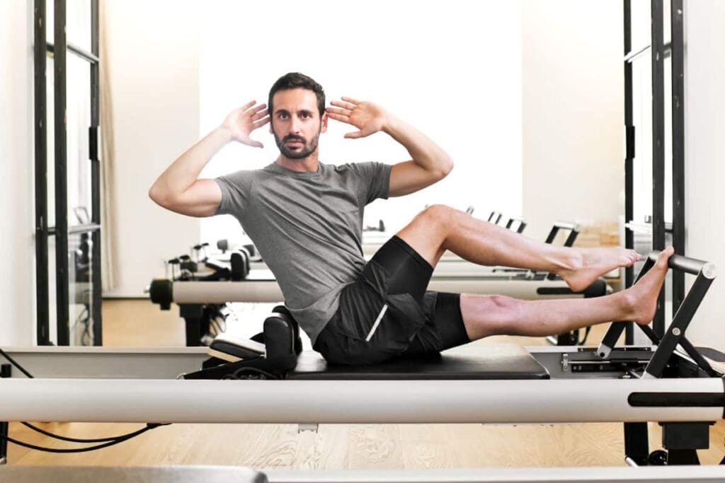 A man working out in the gym after vaping