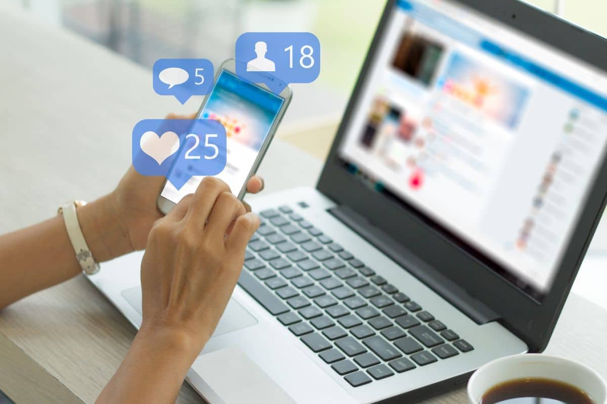A lady using social media on her laptop