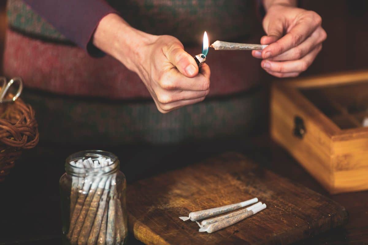 A guy taking care of the pre rolls