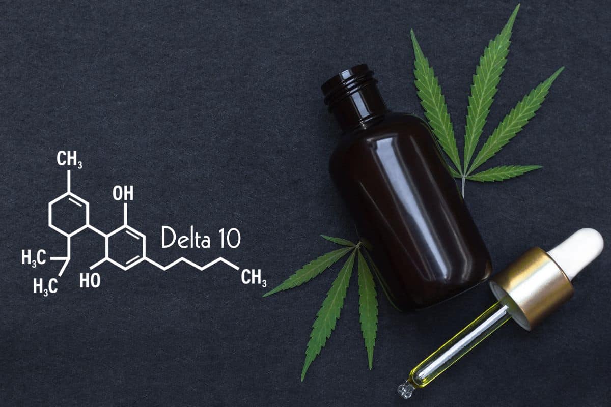 Delta 10 in a bottle with marijuana leaf Delta 10 in a bottle with marijuana leaf