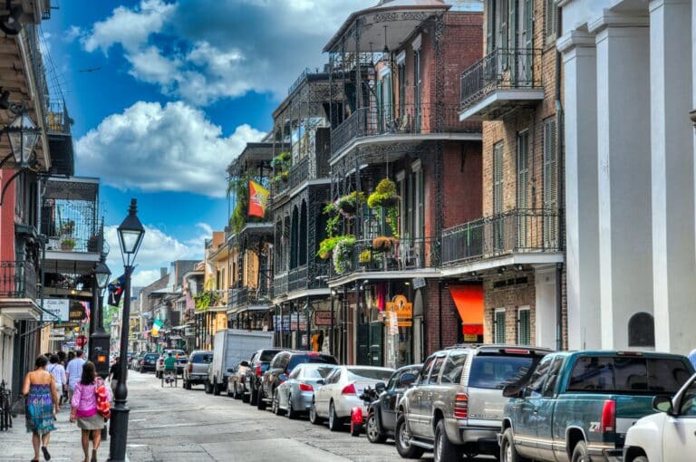 Cars Parked on the Roadside Near City Buildings in new orleans louisiana