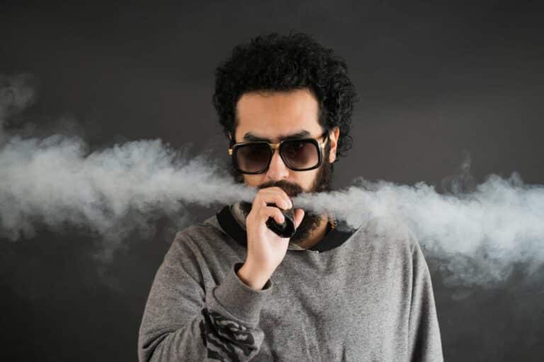 A guy vaping delta 9 thc