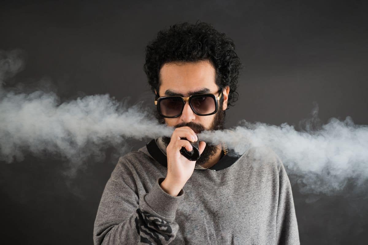 A guy vaping delta 9 thc