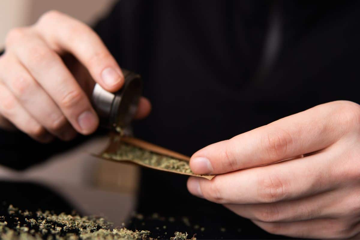 A man making blunt from his hands