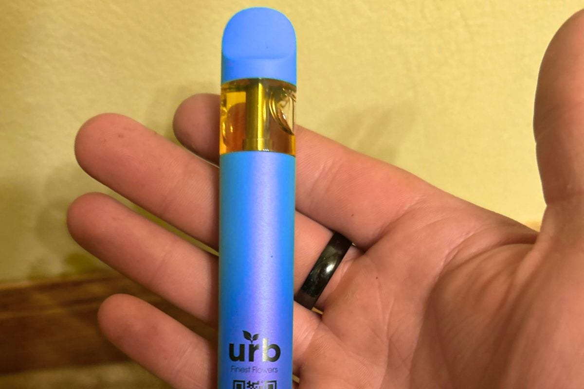 A person is holding urb vape