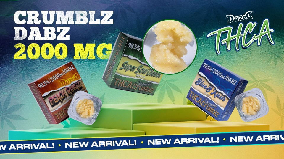 Image of various cannabis concentrate products labeled CRUMBLZ DABZ 2000 MG from THCA Dazed. Three containers of crumbled concentrate are shown in front of colorful boxes. Text says NEW ARRIVAL! on a blue banner.