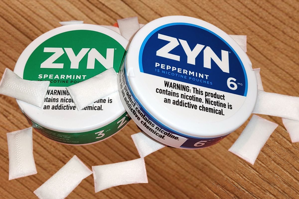 Two ZYN nicotine flavor kept together with some nicotine pouches