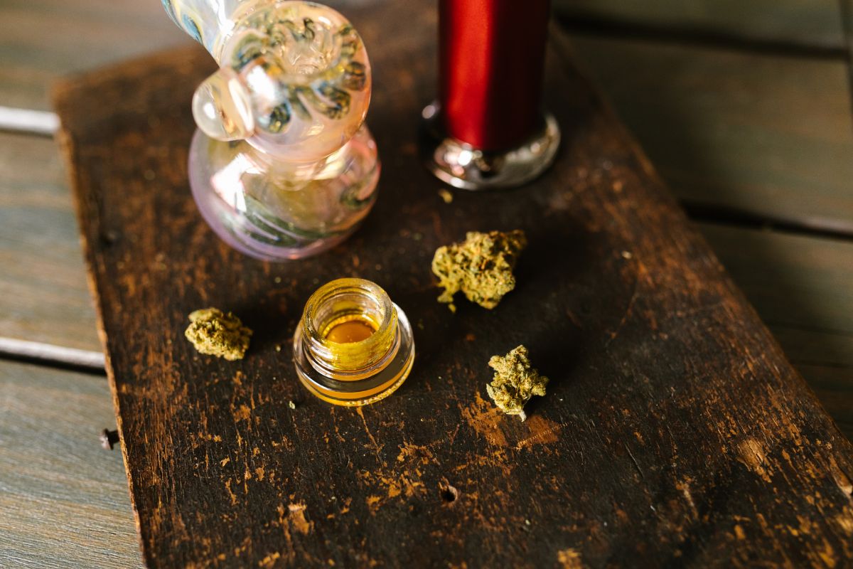 A person dabbing and using cannabis concentrate with it