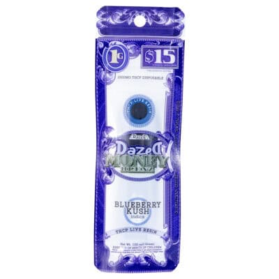 The blue and white Dazed8 Money Bag package displays the Blueberry Kush indica Dazed THCP Money Blenz Disposable 1g with 3000mg. Priced at $15, it features a cannabis leaf icon, adult-use warnings, and a design similar to Money Blenz currency.