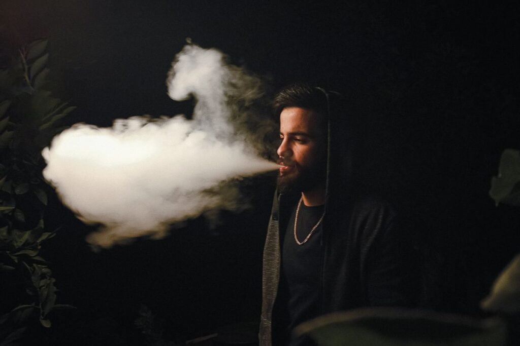 A person vaping raz bar vape