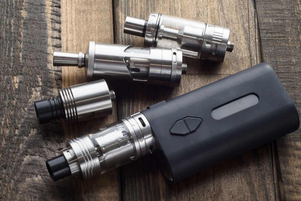 A vape with its different modifiers shown in the image for less vapor generation