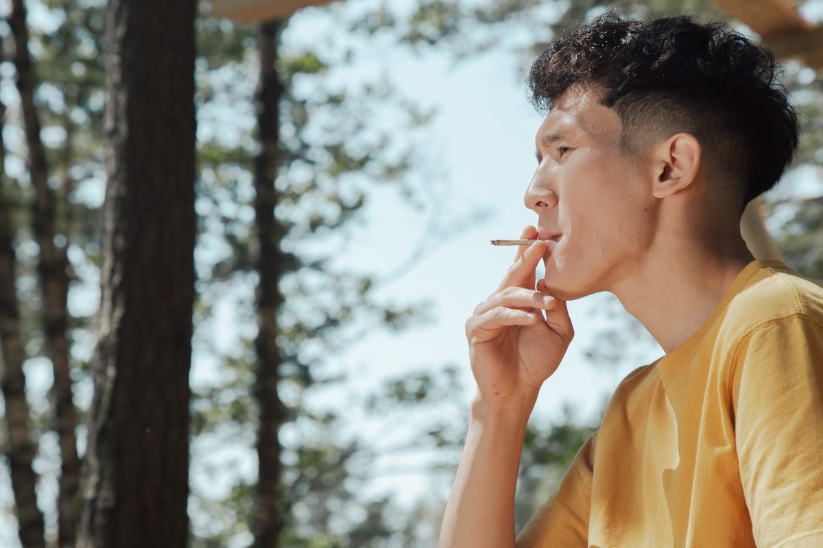 An occasional smoker smoking weed that contains THC