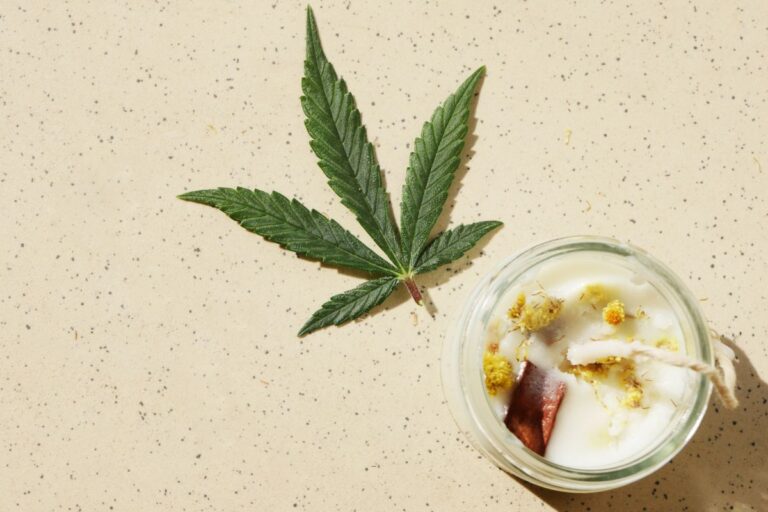 A cannabis candle shown in the image