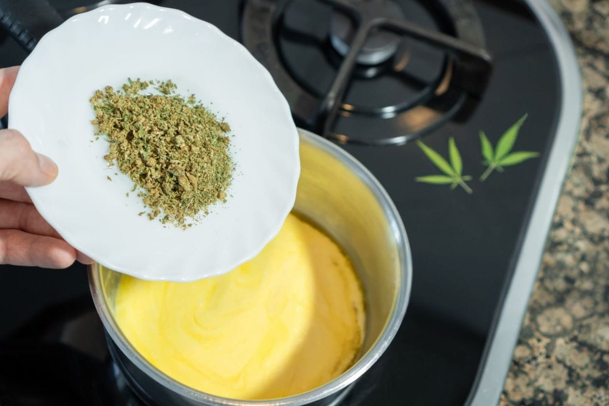 A person cooking cannabutter at home