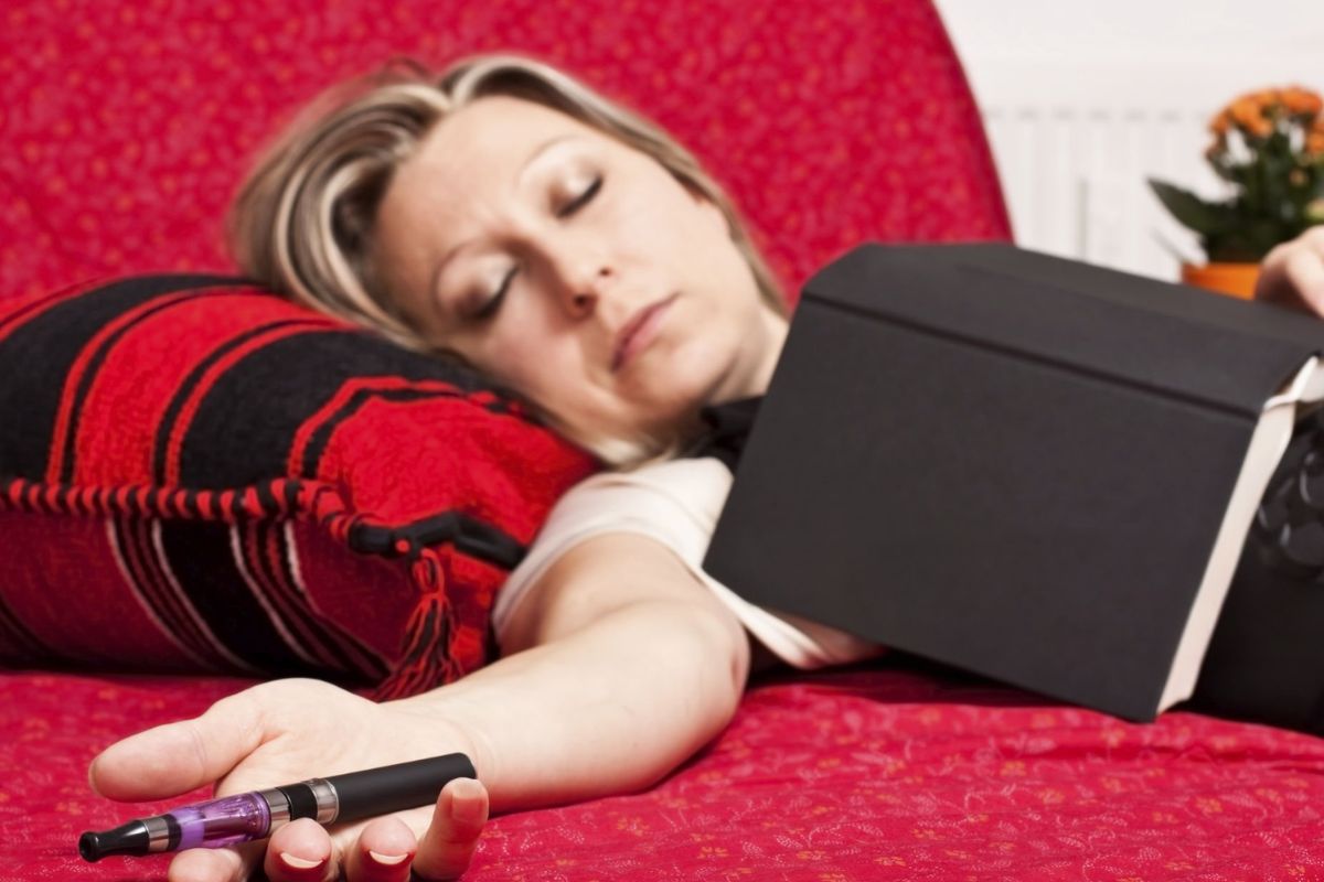 A woman falls asleep after vaping Delta-9 THC