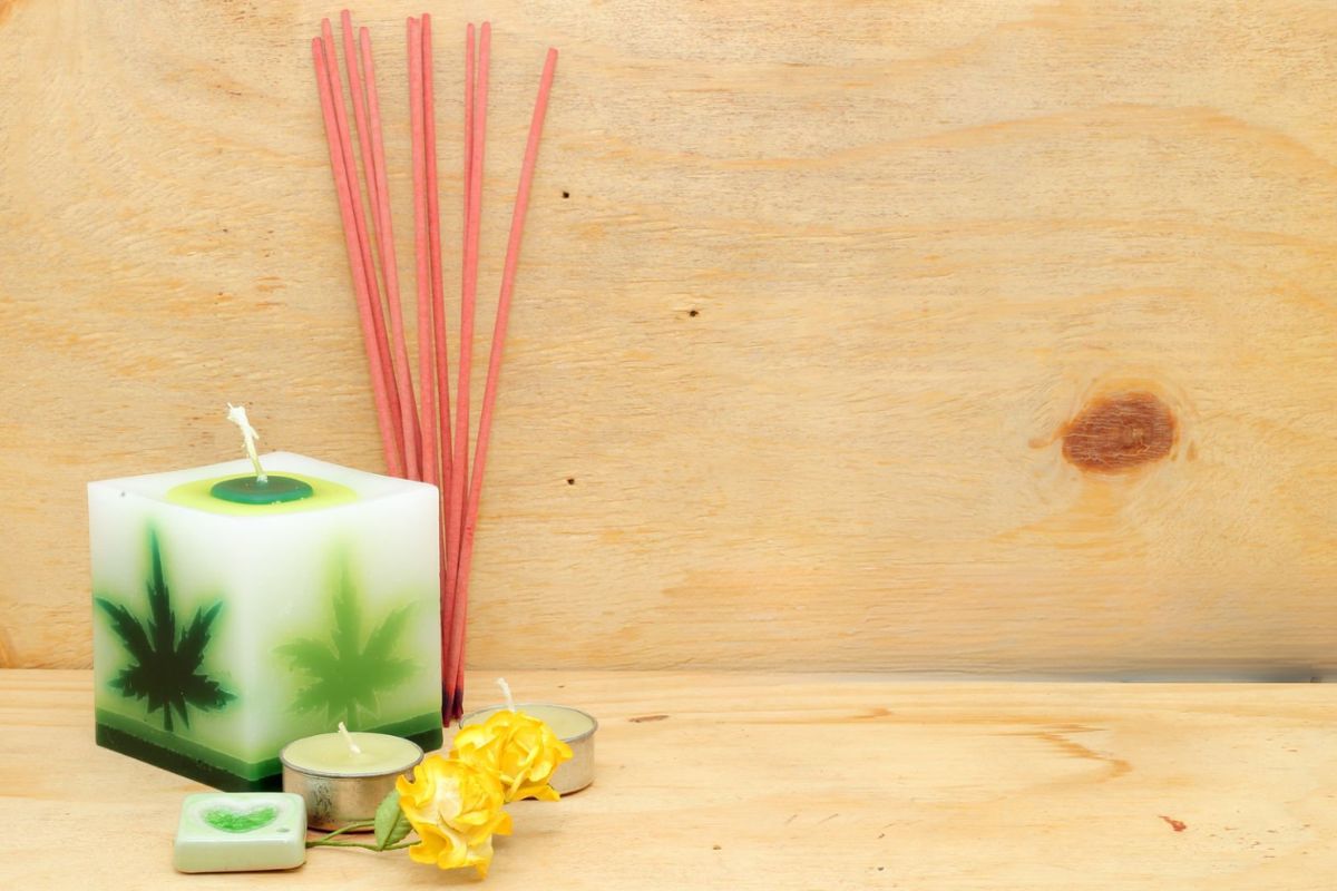 Different cbd candles kept with some other items