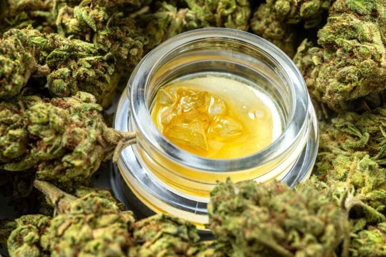 A high-quality liquid dab kept alongside cannabis flower