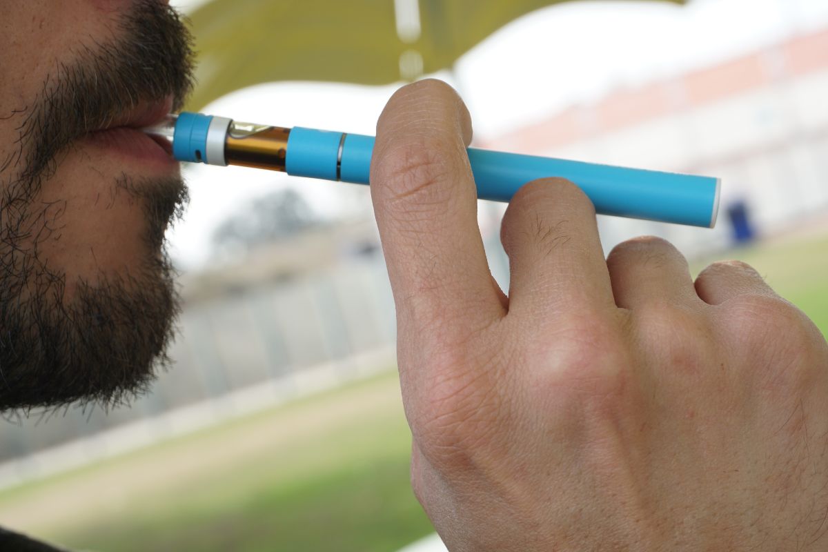 A person using a Penjamin vape for vaping